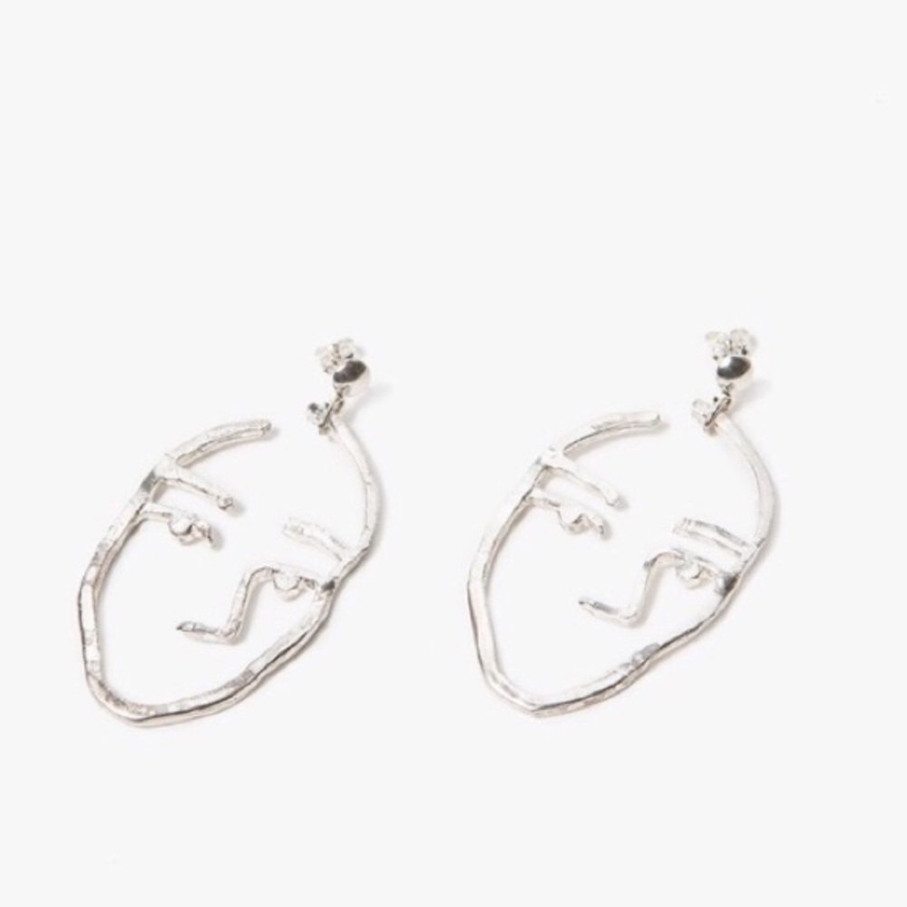 Hollow Face Statement Earrings